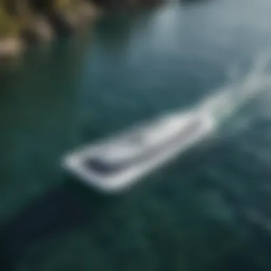 A sleek, modern battery-powered water board gliding over clear waters