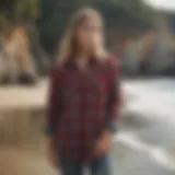 Stylish flannel shirt displayed against a coastal backdrop