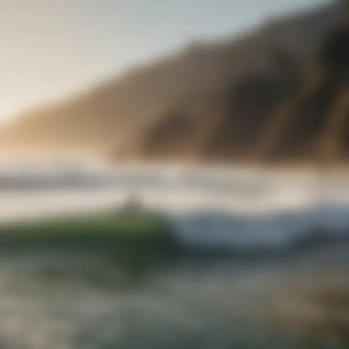 An iconic California coastal landscape with surfers riding waves