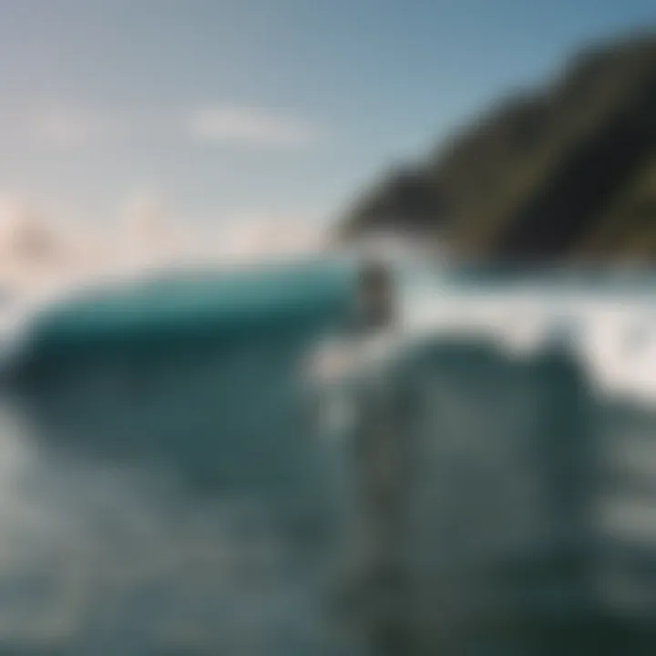 Surfer riding a wave with the Akila Aipa Twin Fin board.