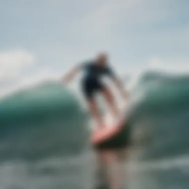 Surfer riding a wave on the Costco soft top surfboard