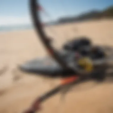 Close-up of kitesurfing gear on the sandy shore