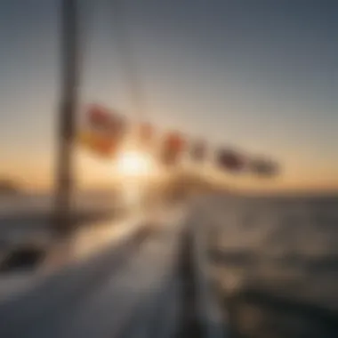 A scenic view of a boat with flags hoisted at sunset