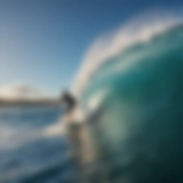 A surfer catching a wave at one of Maui's renowned surf spots