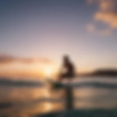 A vibrant sunset view with a skim boarder gliding over the water's surface.