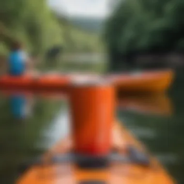 A vibrant Corkcicle Mug resting on a kayak with scenic water backdrop