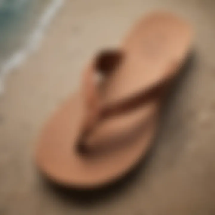 Close-up view of Olukai Ohana Koa flip flop showcasing unique design details