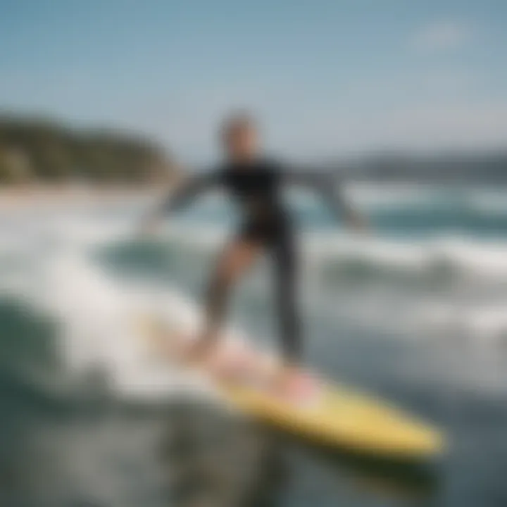 A group of campers participating in a surf lesson with an instructor