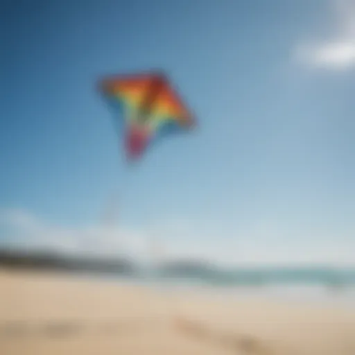 A colorful beach kite soaring against a clear blue sky