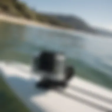 GoPro clip attachment securely mounted on a surfboard