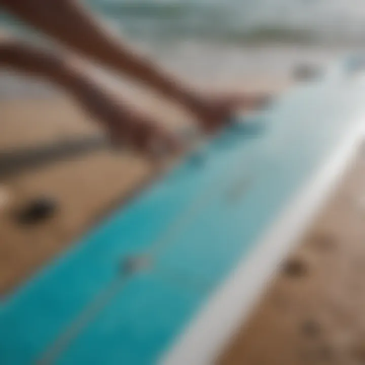 Close-up of SUP board dimensions being measured with a tape