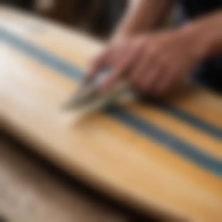 Close-up of a surfboard being shaped with precision tools