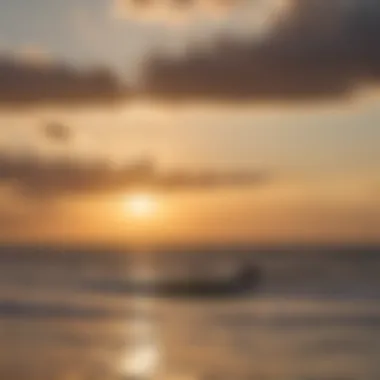 A serene sunset view over a kitesurfing spot in Mexico, with silhouettes of kitesurfers enjoying the water.