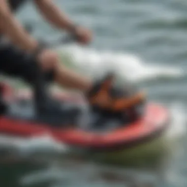 Close-up of kneeboarding gear including the board and safety equipment