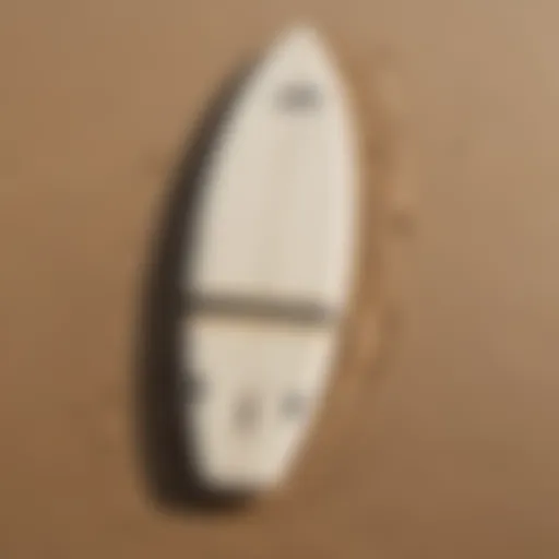 A surfboard half-buried in the sand, symbolizing loss