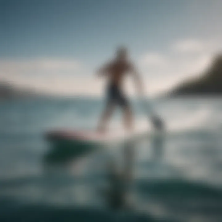 A dynamic paddleboarder gliding over waves showcasing speed skimming technique.