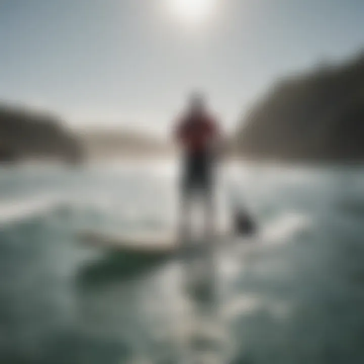 Paddle boarder navigating through ocean conditions