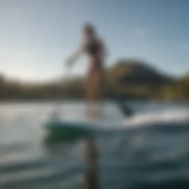 A stand-up paddle board gliding effortlessly on water with electric propulsion