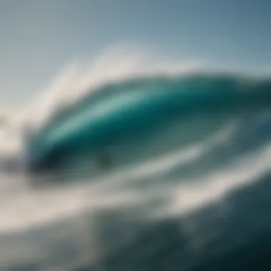 An aerial view of surfers riding powerful waves in a beautiful ocean