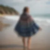 A modern surf poncho on the beach showcasing unique patterns