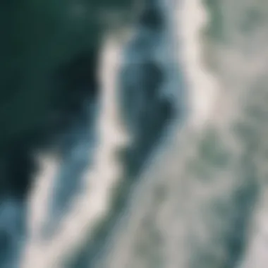 Aerial view of ocean waves crashing on the shore