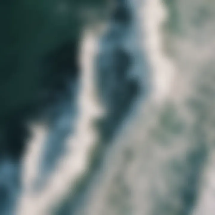 Aerial view of ocean waves crashing on the shore