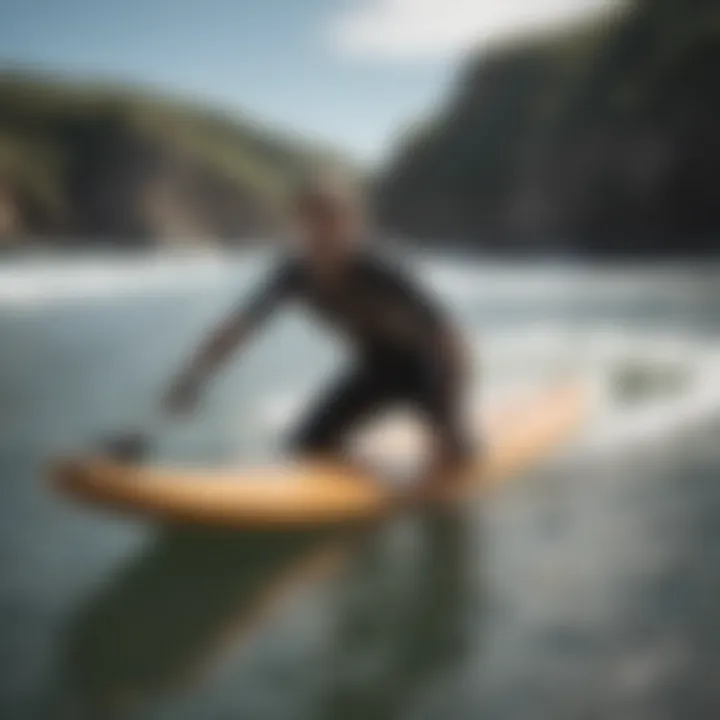 A surfer demonstrating proper paddling technique in the water.