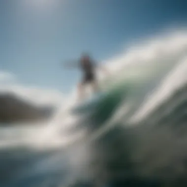 Dynamic action shot of wake surfing behind a boat