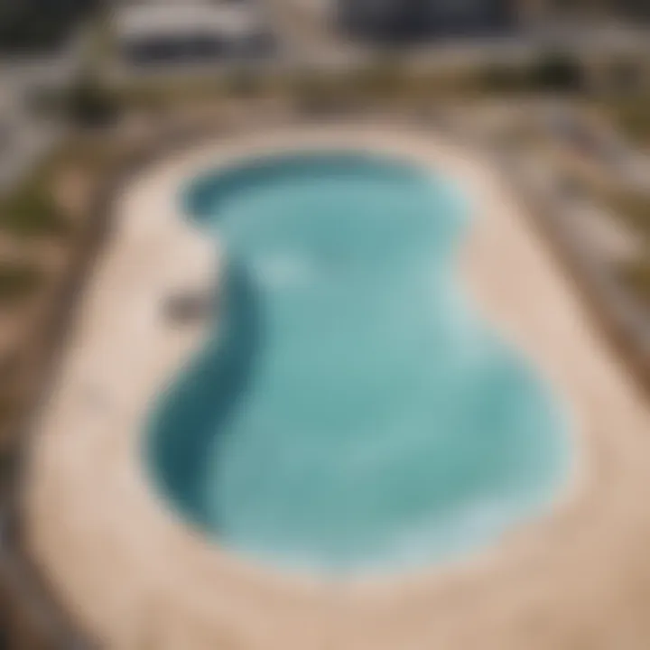 An aerial view of a modern wave pool in a recreational setting