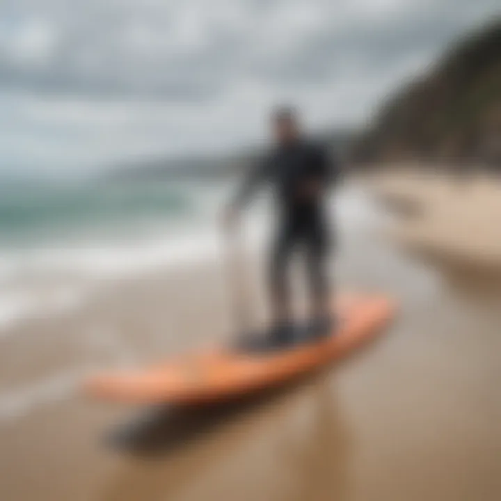 Essential wedge surfing equipment displayed on the beach