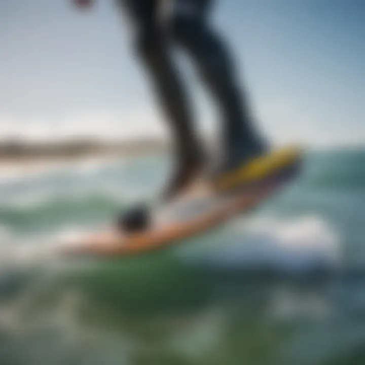 Close-up of WOO performance tracking device mounted on a kitesurfing board